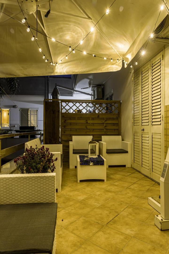 Le Palme Guest House Racale Esterno foto