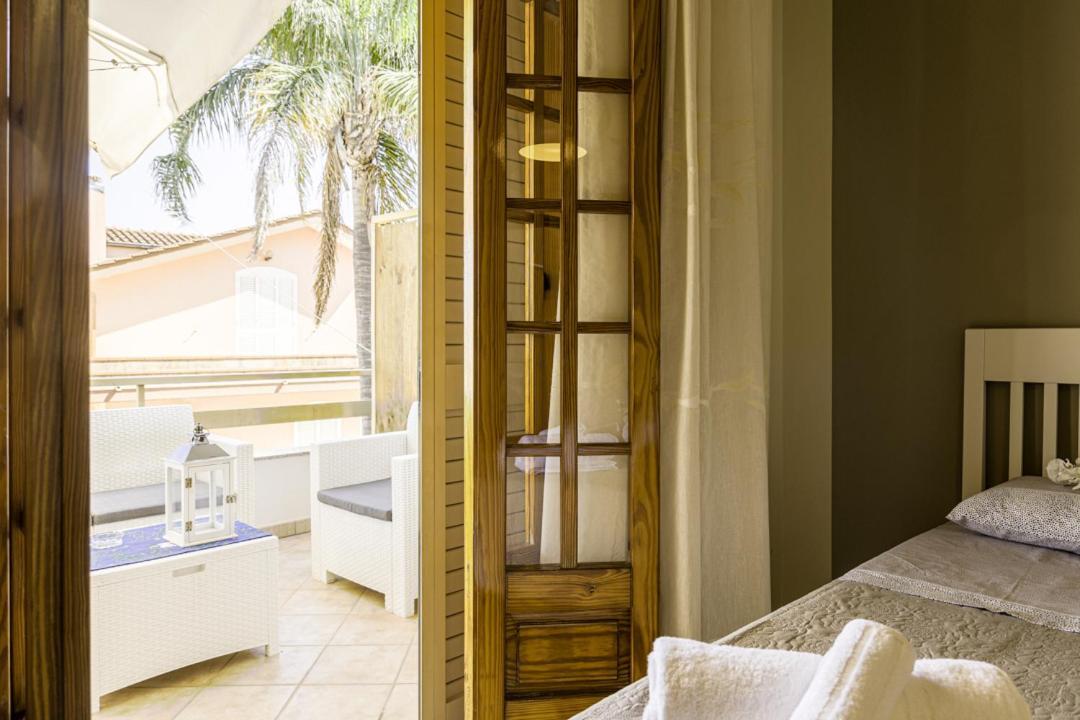 Le Palme Guest House Racale Esterno foto